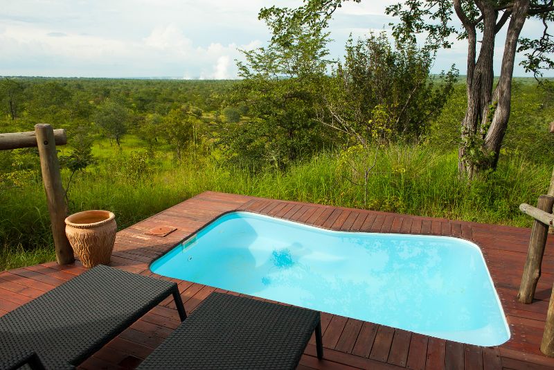 Timber-look deck bordering a swimming pool